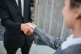 Business people shaking hands